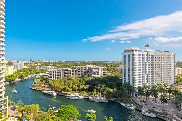 a kitchen with cabinets and white appliances