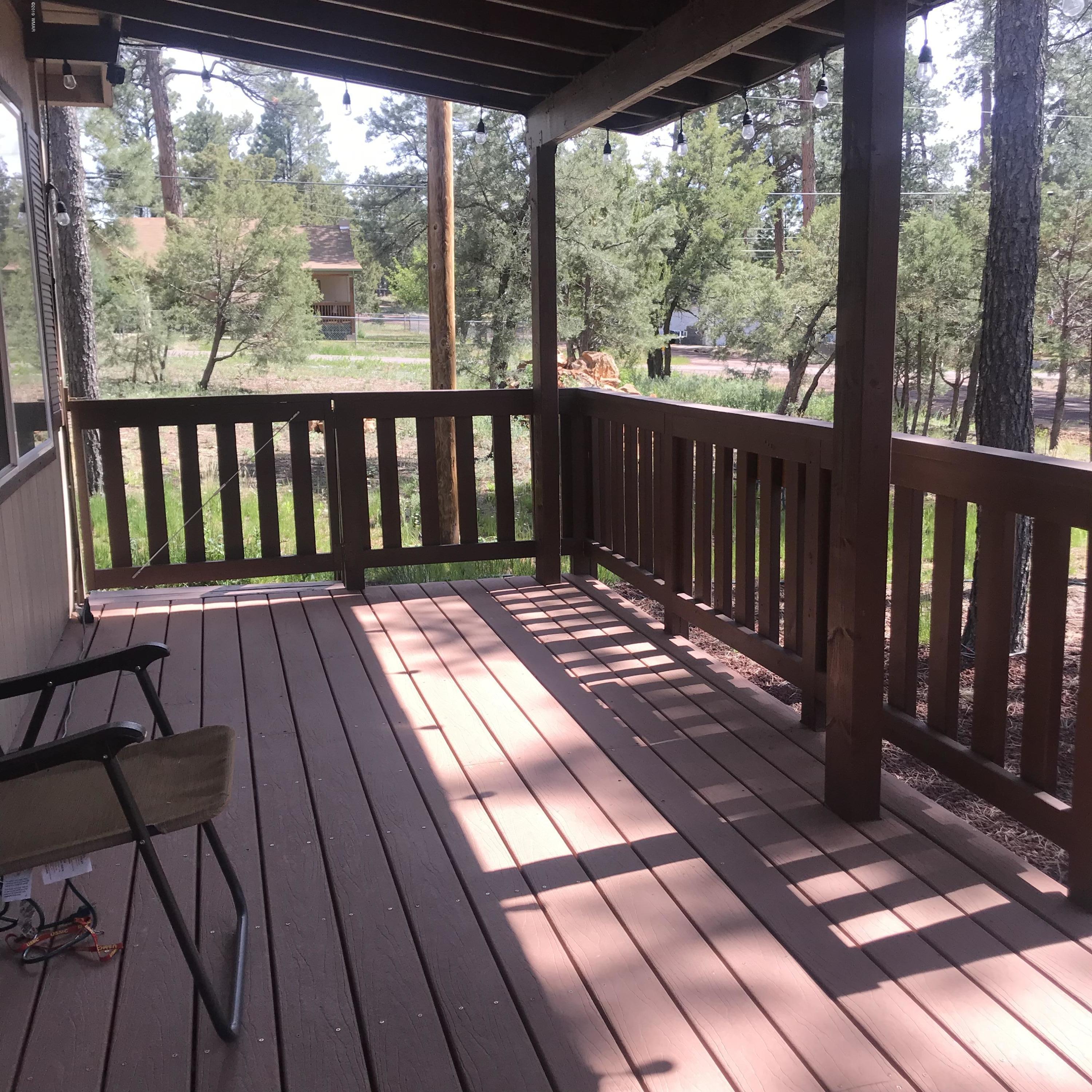 2883 Belle Road Overgaard, AZ 85933 - Photo 11 of 13 a view of balcony with wooden floor