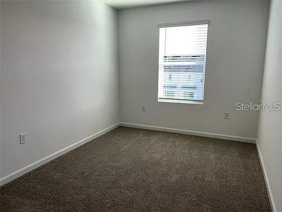 an empty room with a window