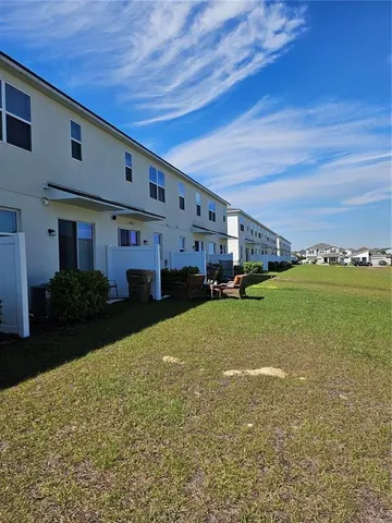 a swimming pool view with a outdoor space