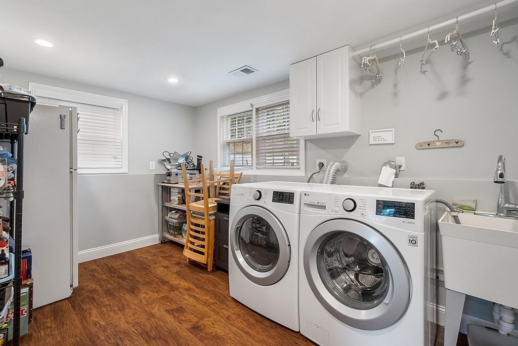 13 Clinton Road Peabody, MA 01960 - Photo 22 of 39 a view of kitchen with washer and dryer