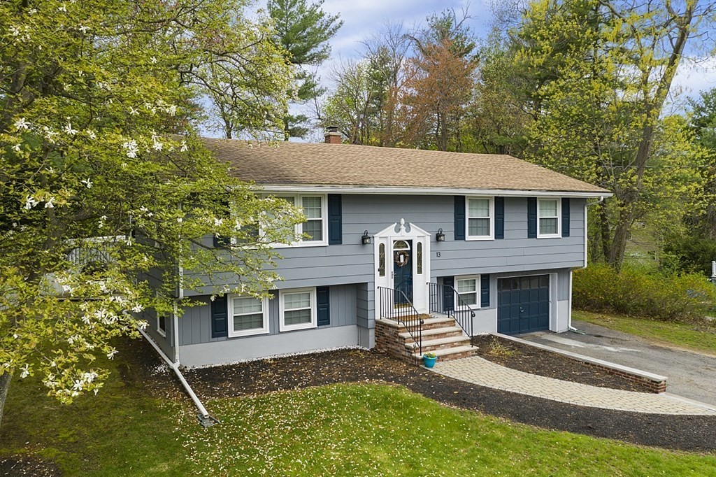 13 Clinton Road Peabody, MA 01960 - Photo 30 of 39 front view of a house with a yard