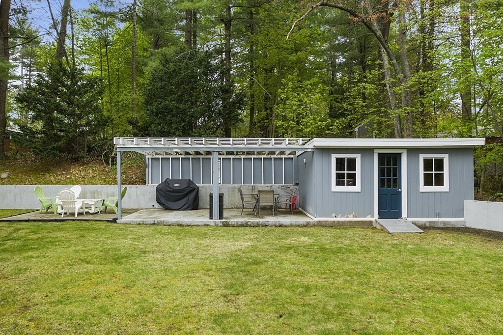 13 Clinton Road Peabody, MA 01960 - Photo 31 of 39 a view of a house with backyard and sitting area