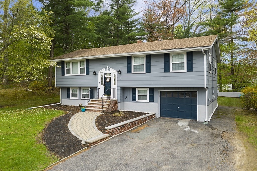 13 Clinton Road Peabody, MA 01960 - Photo 38 of 39 front view of a house with a yard