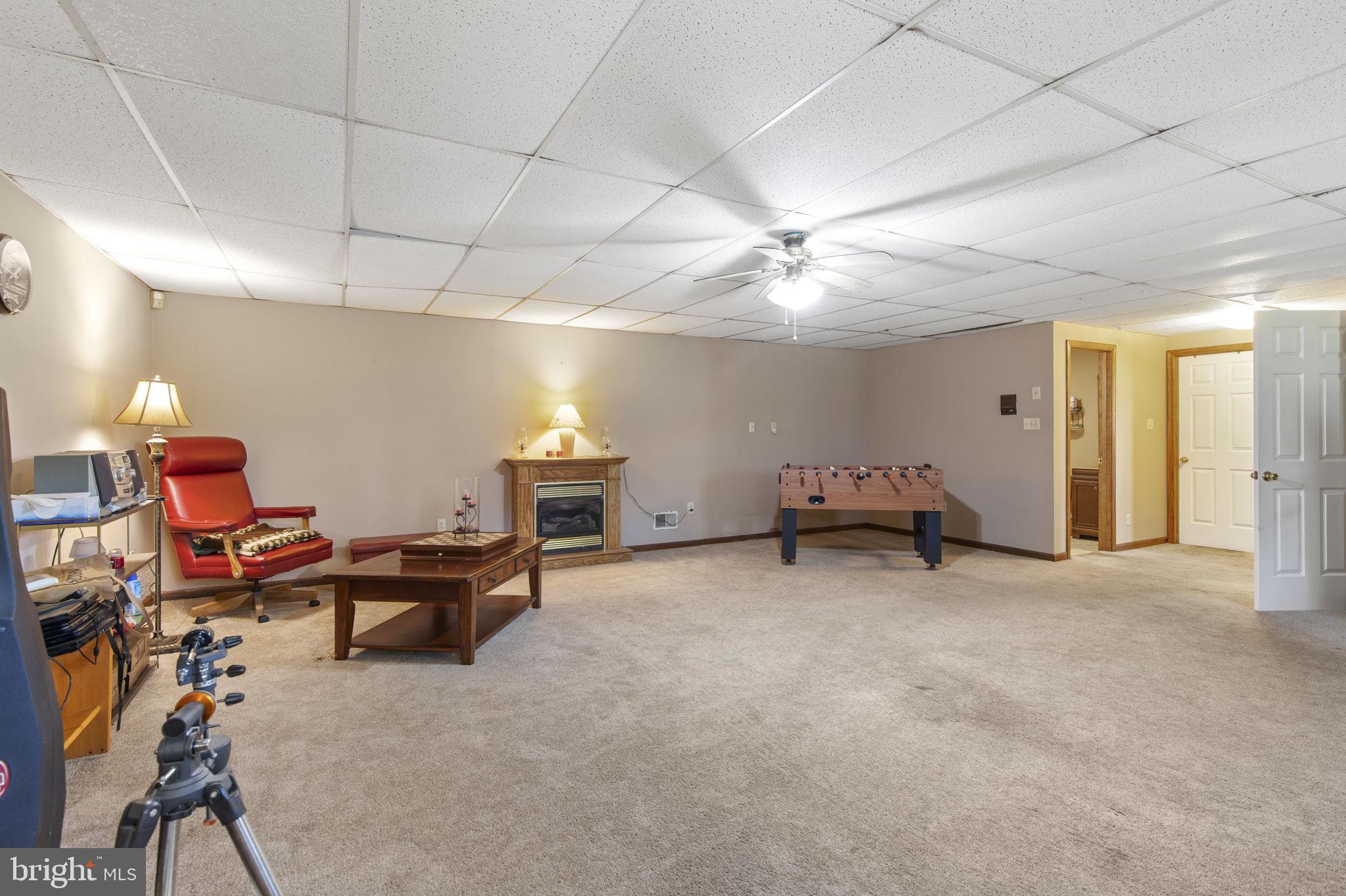 62 Porters Bridge Road Colora, MD 21917 - Photo 19 of 29 a living room with furniture and a lamp