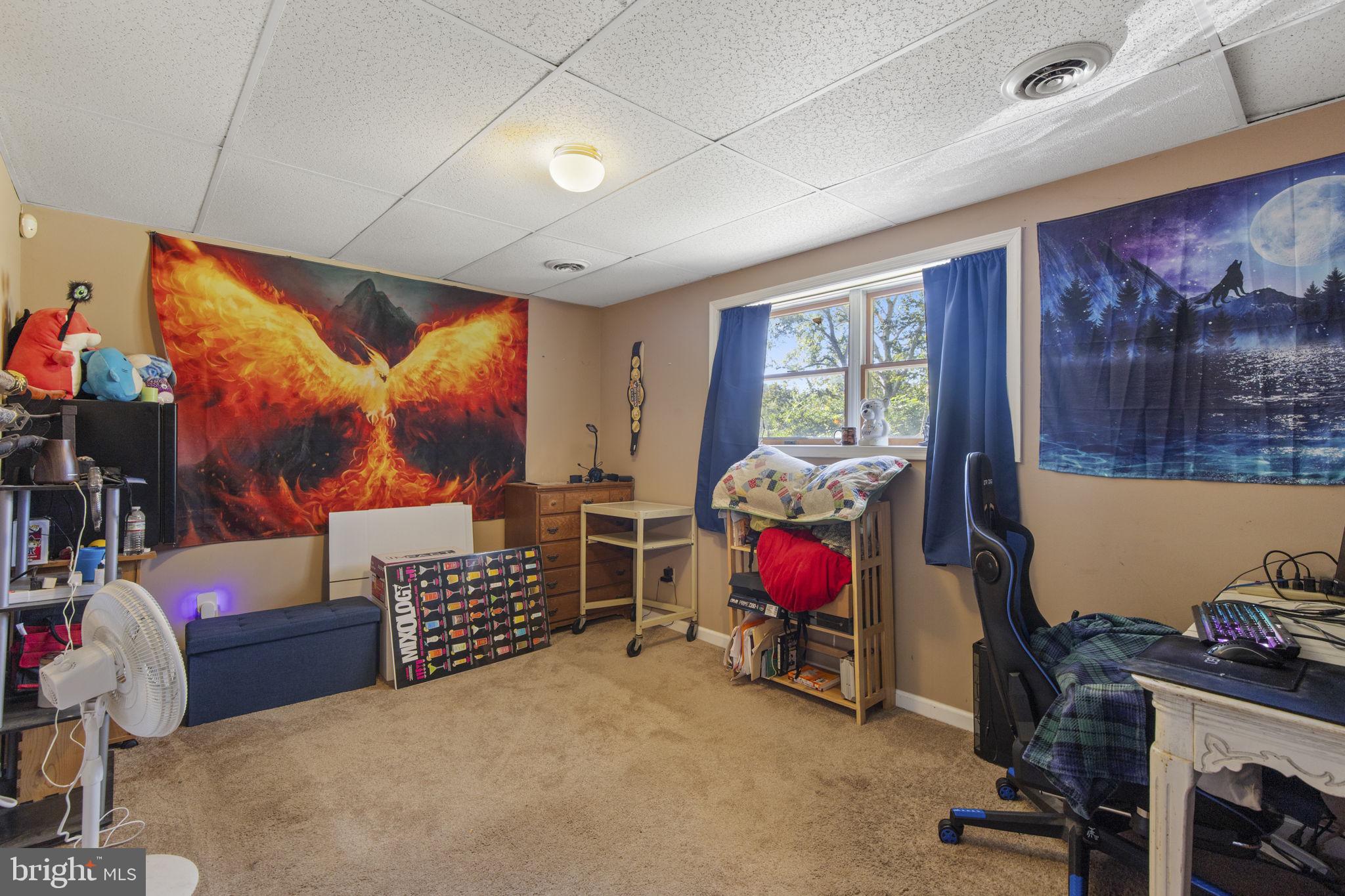 62 Porters Bridge Road Colora, MD 21917 - Photo 20 of 29 a bedroom with furniture and a fan