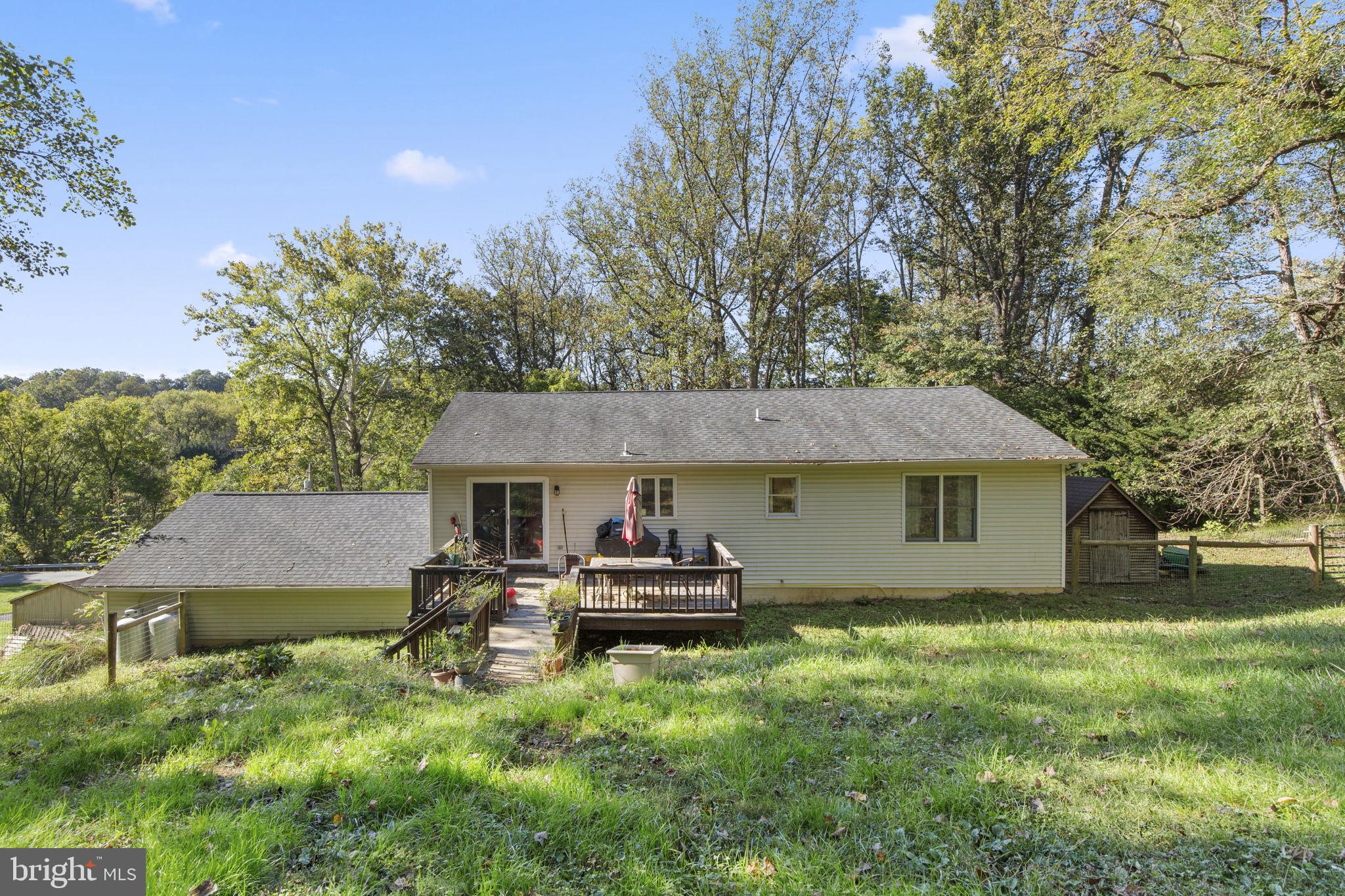 62 Porters Bridge Road Colora, MD 21917 - Photo 24 of 29 a backyard of a house with table and chairs