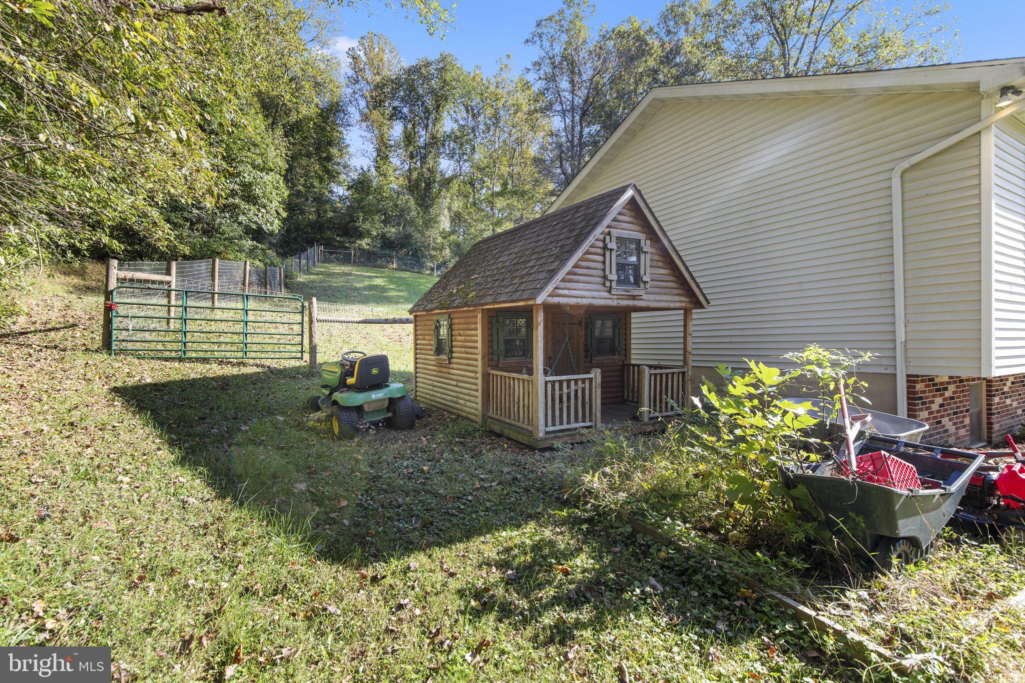 62 Porters Bridge Road Colora, MD 21917 - Photo 25 of 29 a front view of a house with garden