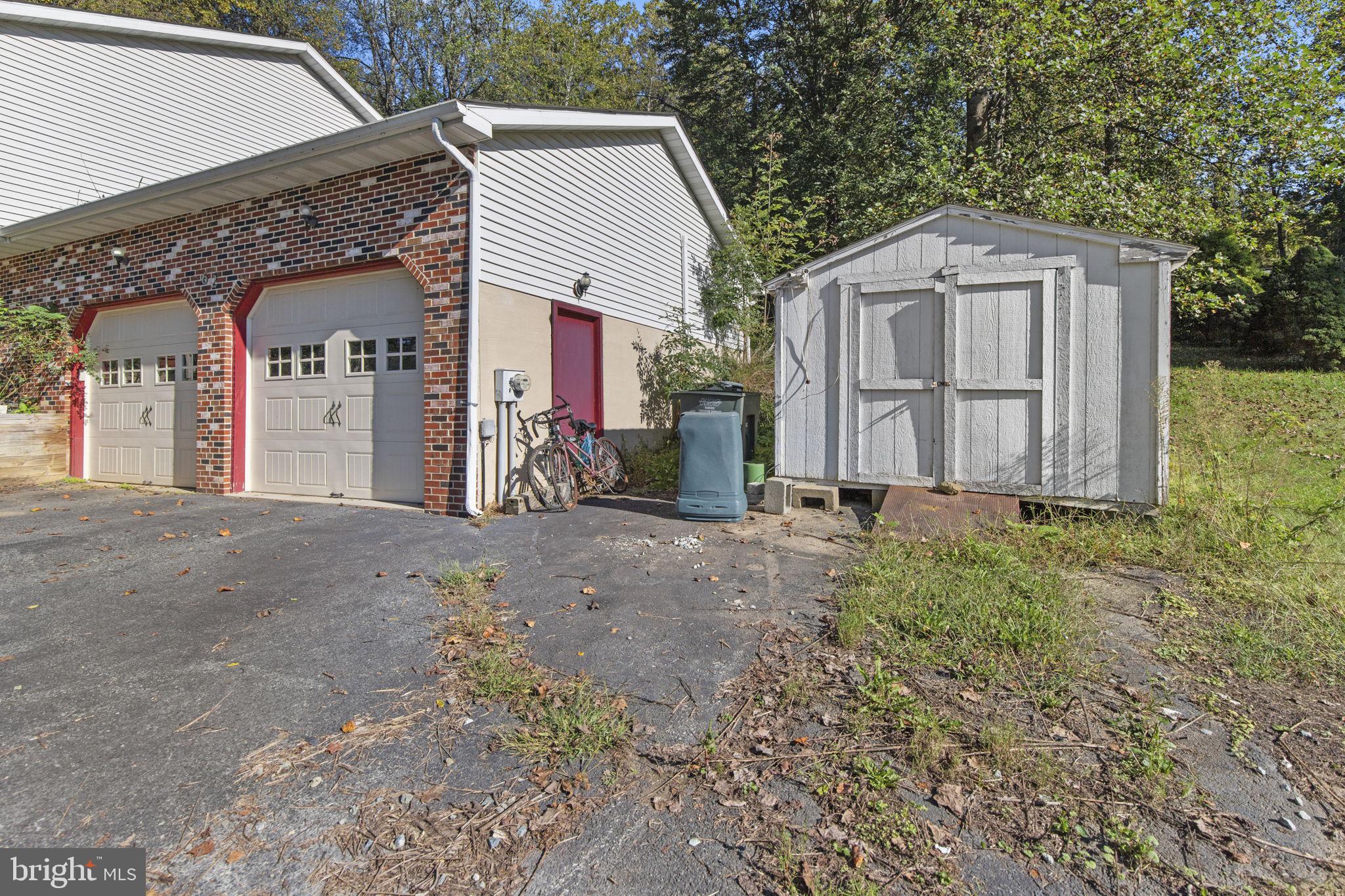 62 Porters Bridge Road Colora, MD 21917 - Photo 28 of 29 a view of a house with a yard and garage