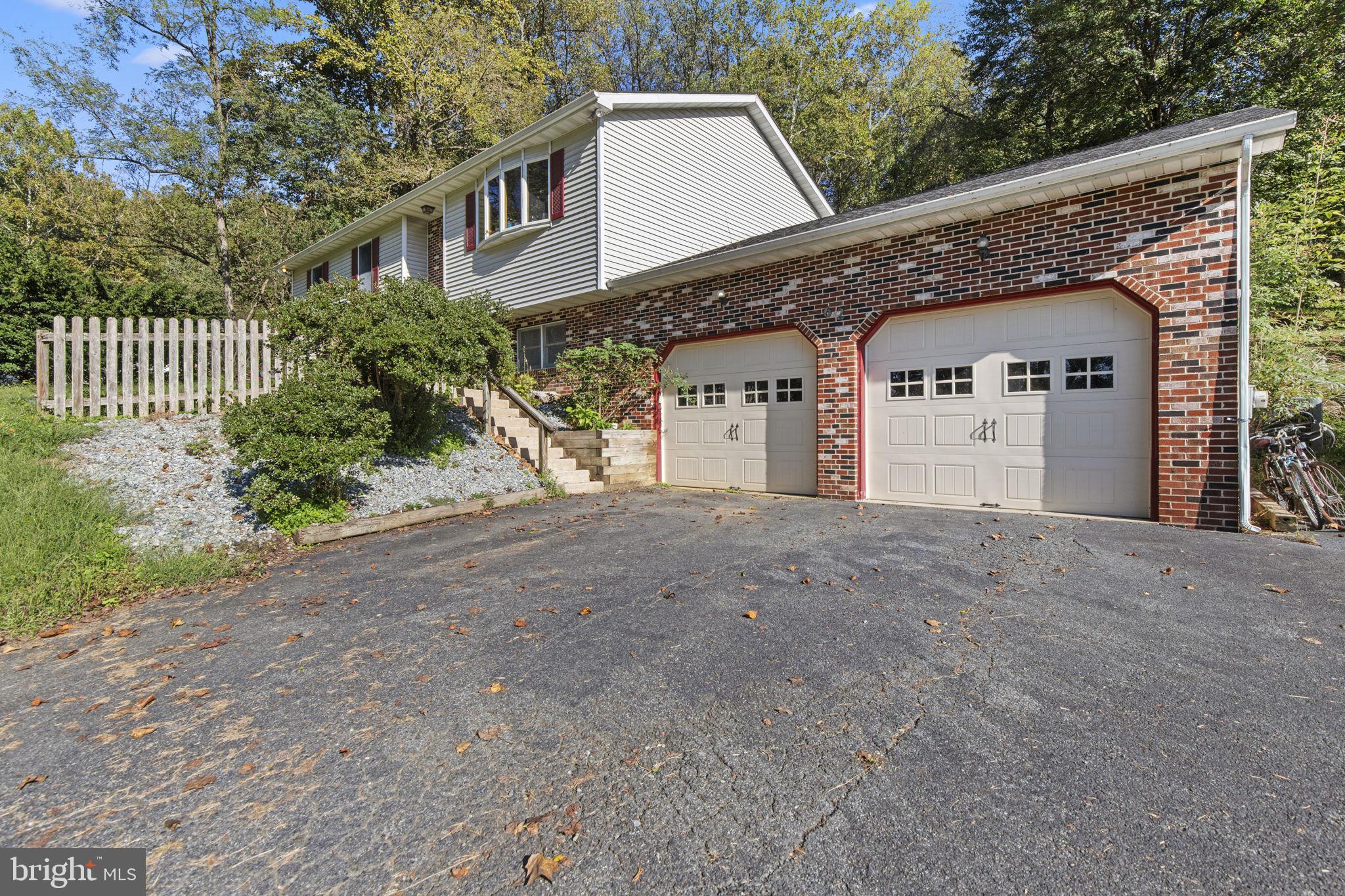 62 Porters Bridge Road Colora, MD 21917 - Photo 29 of 29 a view of a house with a yard and garage