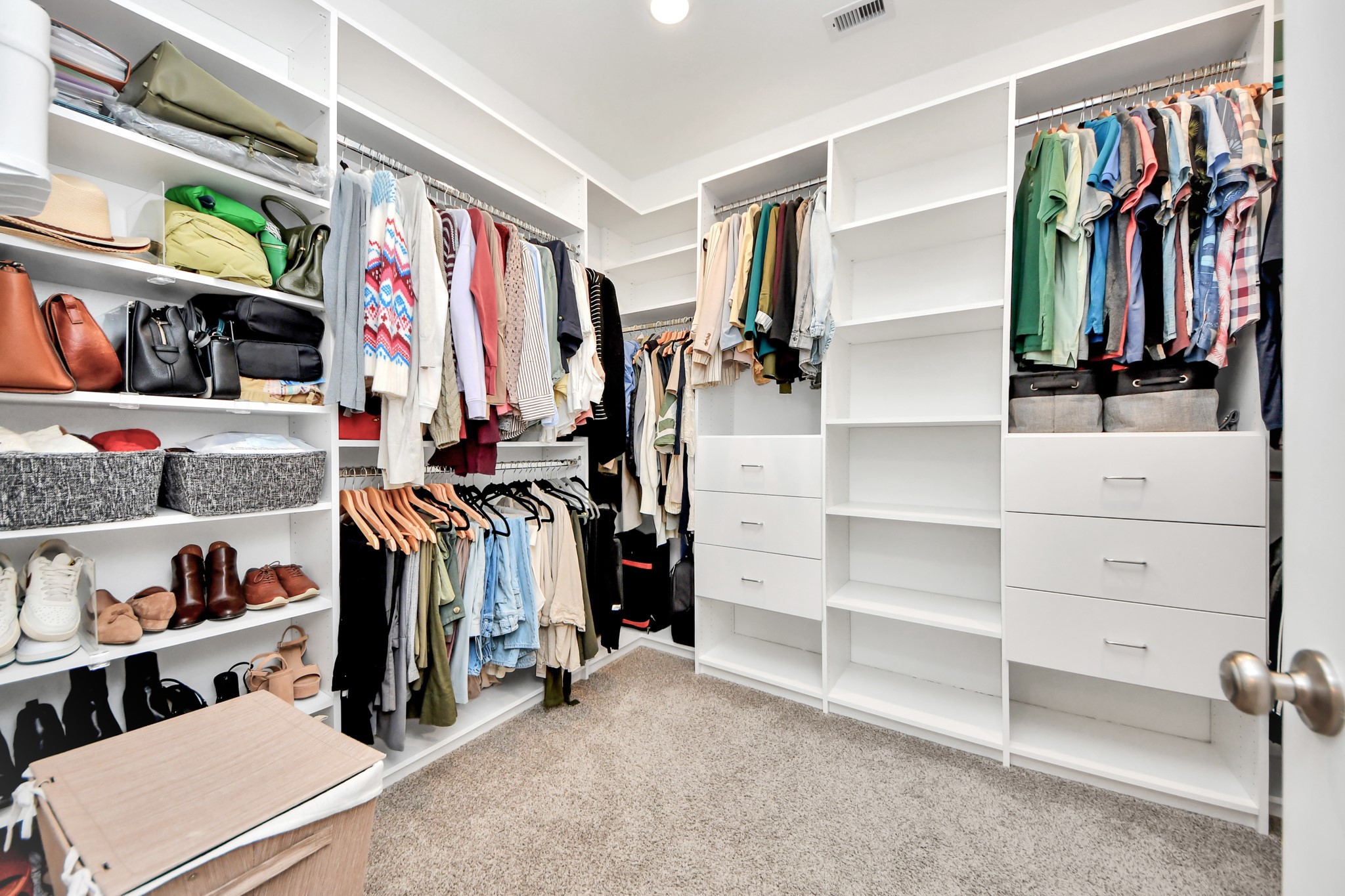 4205 Hatch Silo Lane Houston, TX 77080 - Photo 16 of 36 Custom-built closet cabinetry in the primary suite, offering excellent storage and organization.