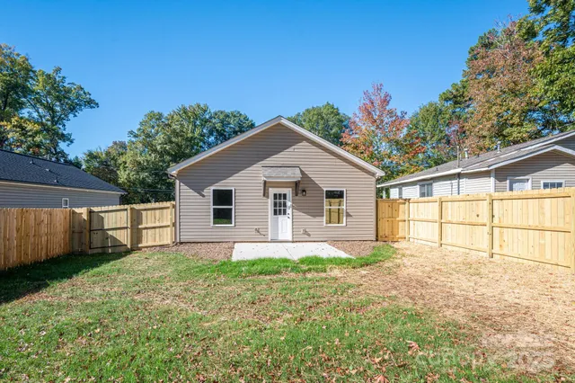 a view of a backyard with a garden