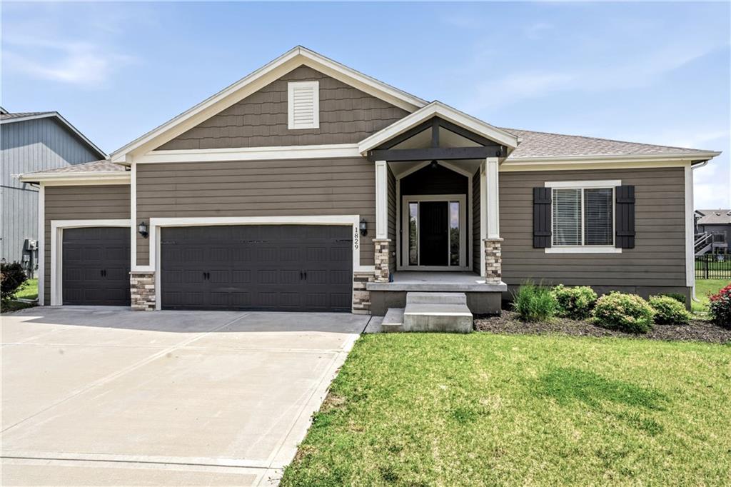 1829 Northeast Riley Drive Lee's Summit, MO 64086 - Photo 1 of 46