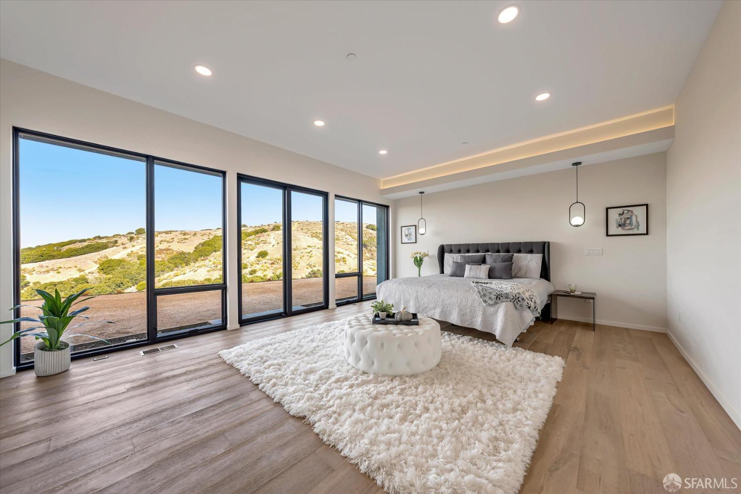 2011 Bishop Road Belmont, CA 94002 - Photo 17 of 35 a bedroom with a large bed and a large window