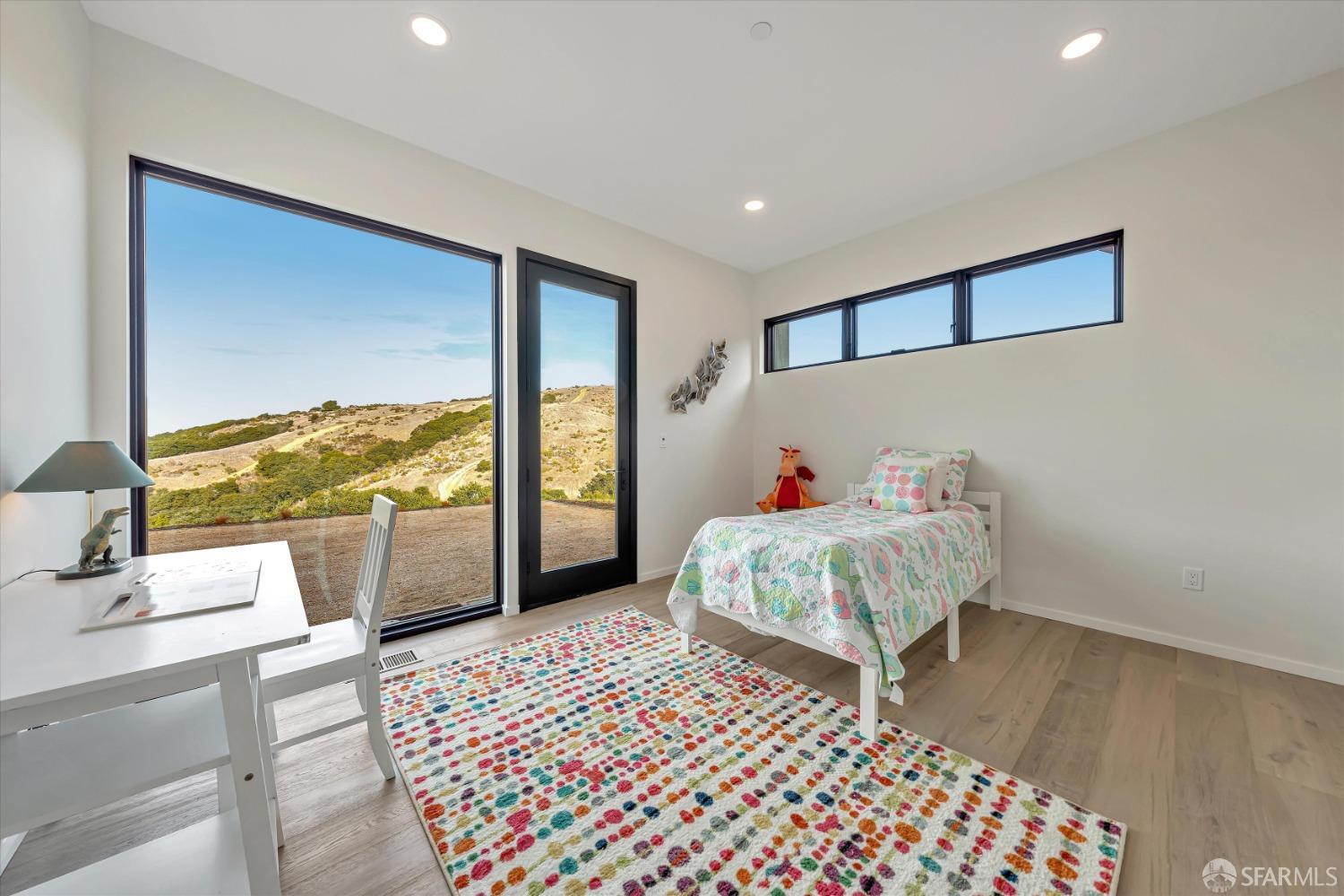 2011 Bishop Road Belmont, CA 94002 - Photo 23 of 35 a bedroom with a large bed and a window