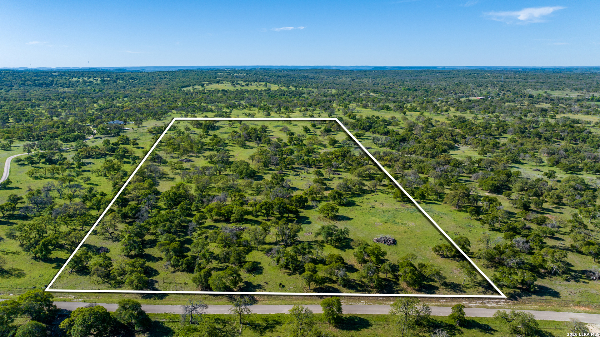 283 Dally Road Comfort, TX 78013 - Photo 2 of 12 a view of a yard with an outdoor space