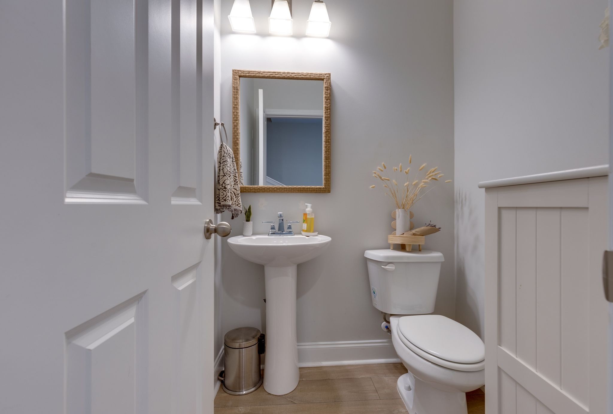 1021 June Wilde Ridge Spring Hill, TN 37174 - Photo 17 of 23 a bathroom with a toilet sink and mirror