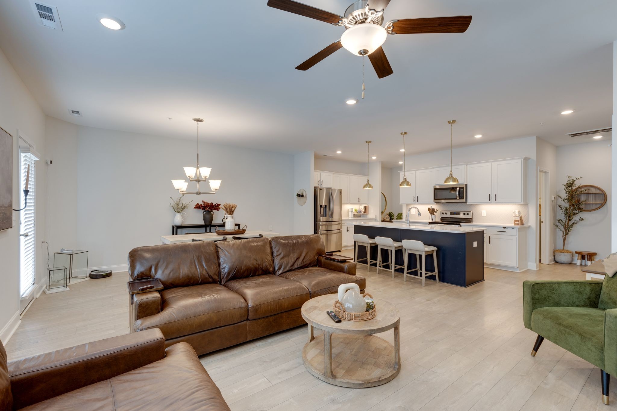 1021 June Wilde Ridge Spring Hill, TN 37174 - Photo 10 of 23 a living room with furniture and kitchen view