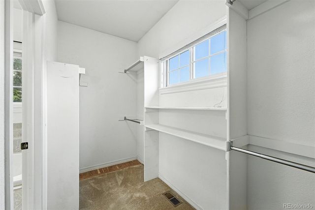 a view of an empty walk in closet