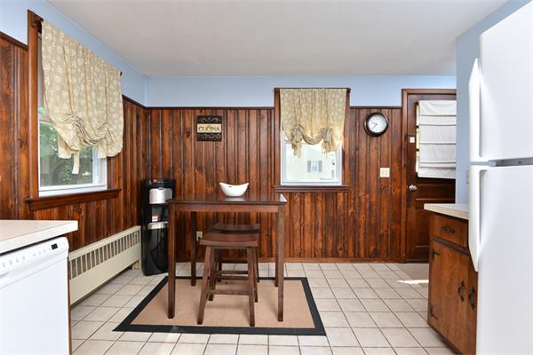49 Farnham Road Stoughton, MA 02072 - Photo 11 of 28 a dining room with furniture and window