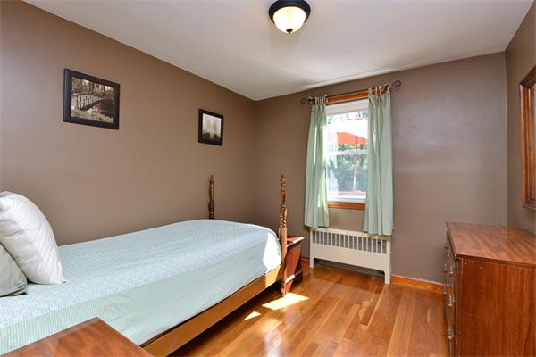 49 Farnham Road Stoughton, MA 02072 - Photo 16 of 28 a bedroom with a bed and a window