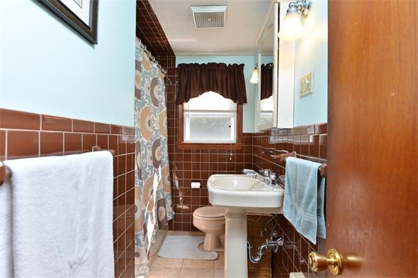 49 Farnham Road Stoughton, MA 02072 - Photo 17 of 28 a bathroom with a sink toilet and shower