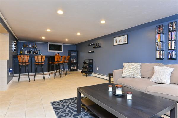 49 Farnham Road Stoughton, MA 02072 - Photo 19 of 28 a living room with furniture and a table