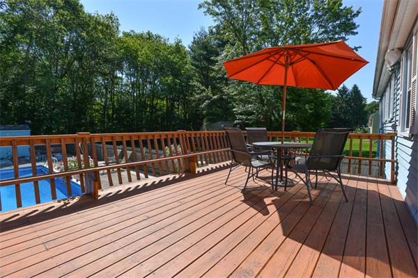 49 Farnham Road Stoughton, MA 02072 - Photo 21 of 28 a view of balcony with seating space and wooden floor