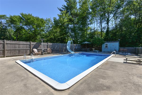 49 Farnham Road Stoughton, MA 02072 - Photo 22 of 28 a view of a backyard with swimming pool