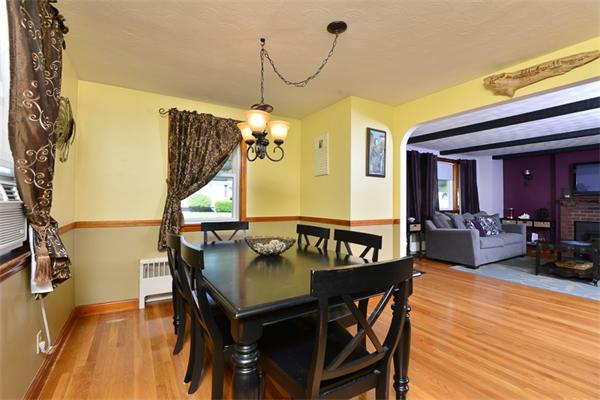 49 Farnham Road Stoughton, MA 02072 - Photo 6 of 28 a view of a dining room with furniture and wooden floor