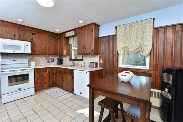 49 Farnham Road Stoughton, MA 02072 - Photo 9 of 28 a kitchen with a sink cabinets and window