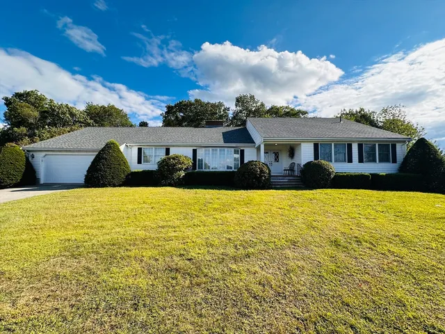 a front view of a house with swimming pool