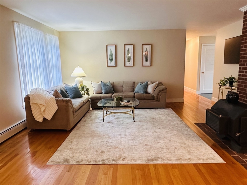 1107 Jackson Road Hardwick, MA 01037 - Photo 14 of 42 a living room with furniture and a flat screen tv