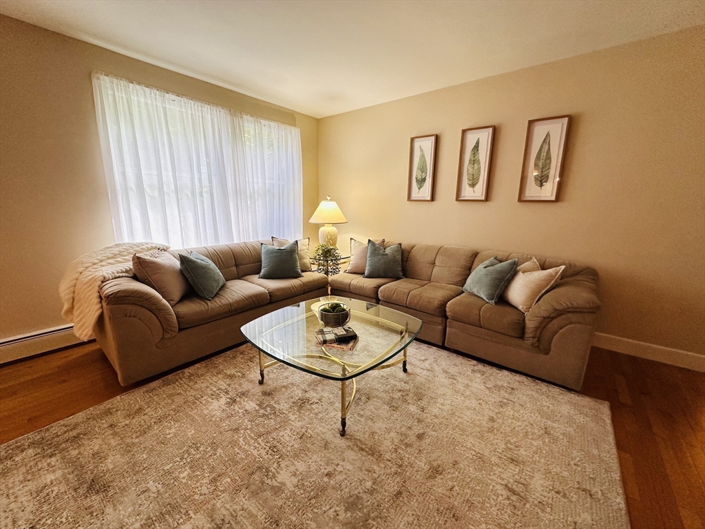1107 Jackson Road Hardwick, MA 01037 - Photo 15 of 42 a living room with furniture and a window