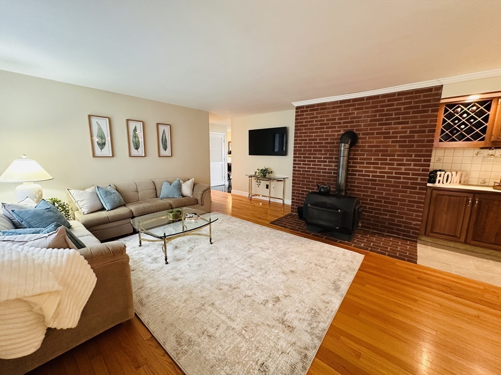 1107 Jackson Road Hardwick, MA 01037 - Photo 16 of 42 a living room with furniture and a flat screen tv