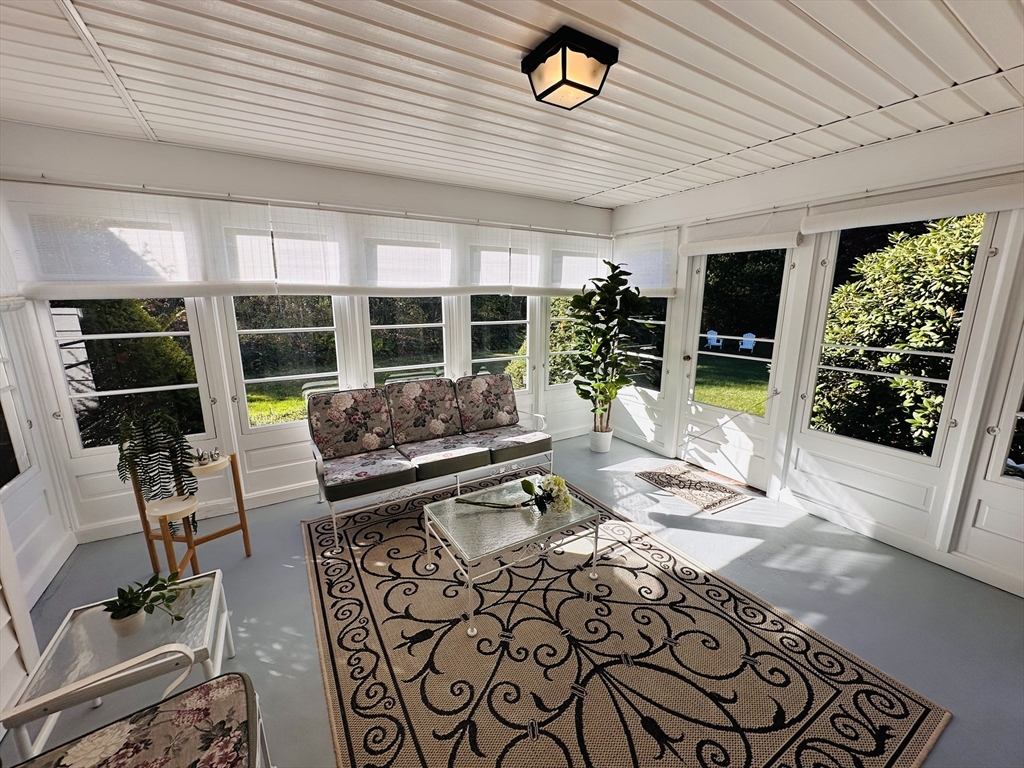 1107 Jackson Road Hardwick, MA 01037 - Photo 18 of 42 a living room with patio furniture and a large window