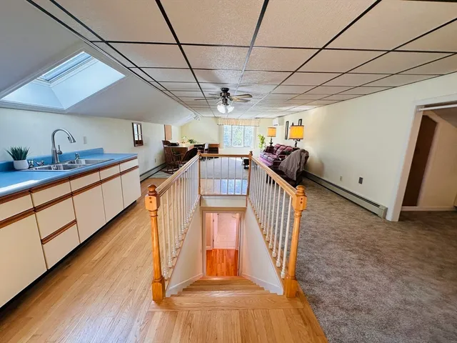 a view of a storage & utility room with two sink