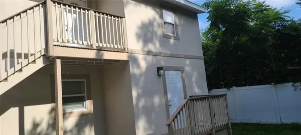 a view of a house with a street