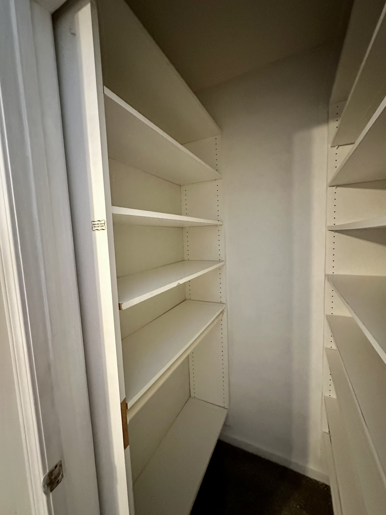 282 Raleigh Drive, Unit B Clarksville, TN 37043 - Photo 14 of 15 a view of walk in closet with empty racks