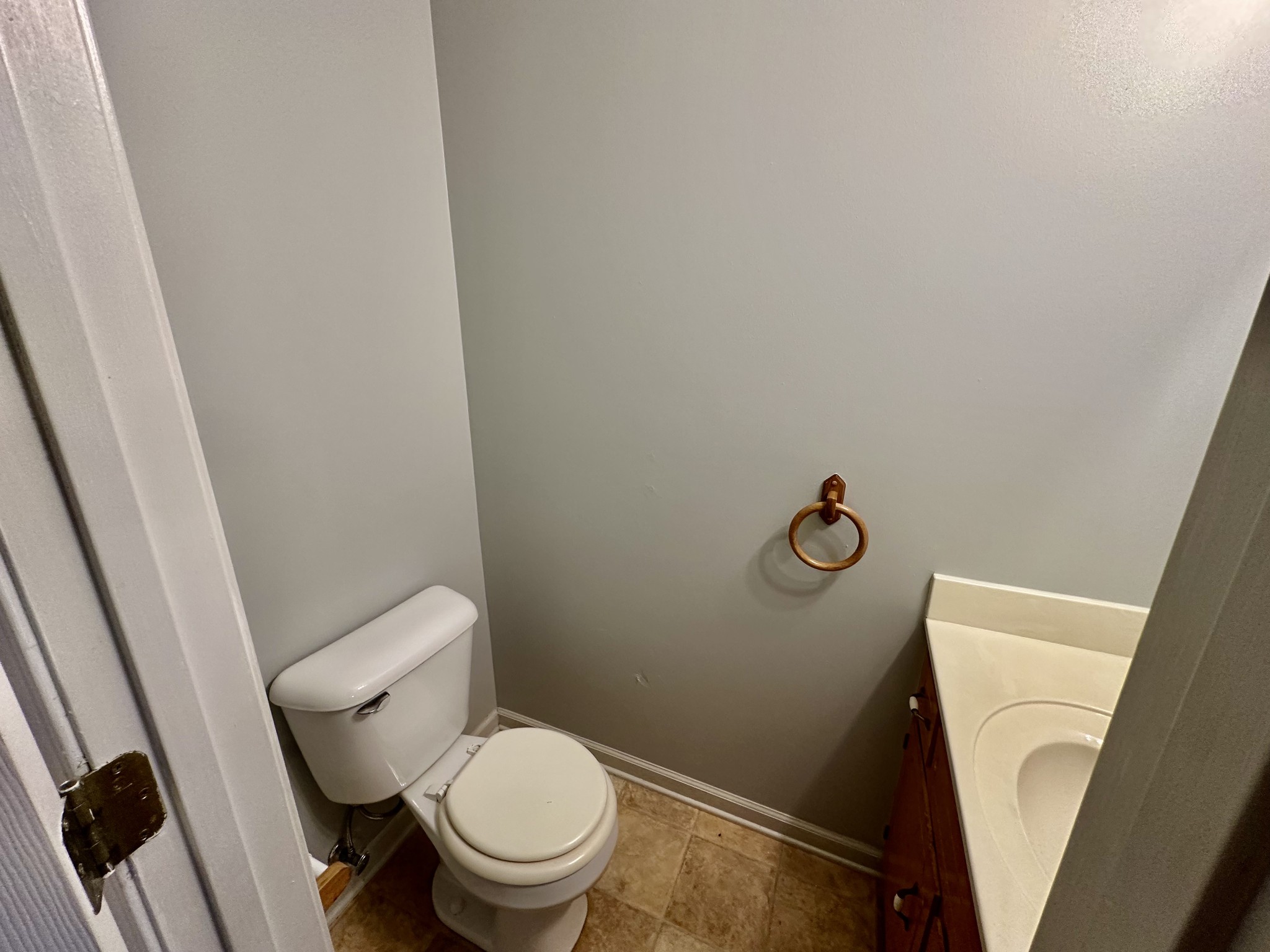 282 Raleigh Drive, Unit B Clarksville, TN 37043 - Photo 3 of 15 a white toilet sitting next to a sink