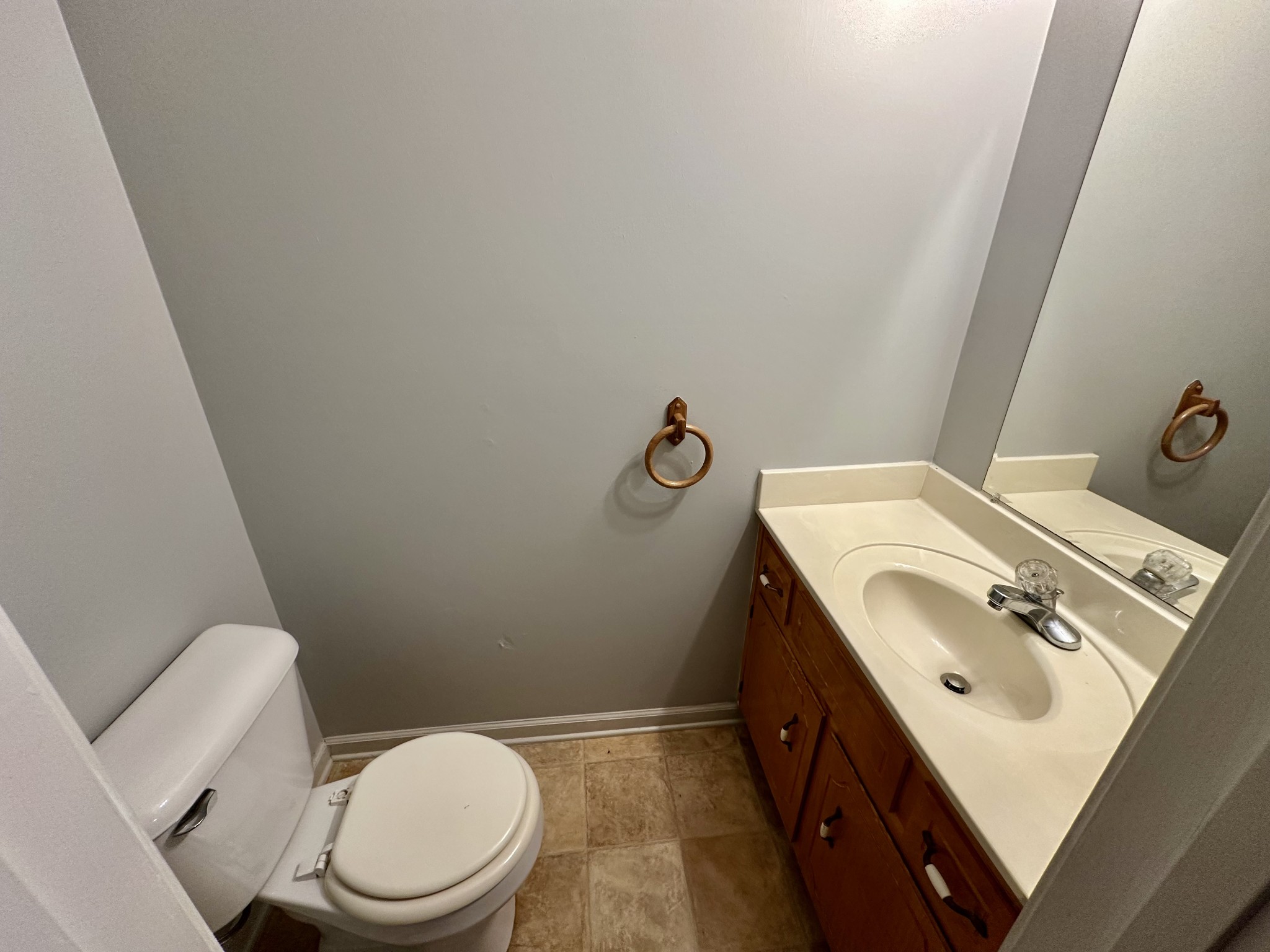282 Raleigh Drive, Unit B Clarksville, TN 37043 - Photo 4 of 15 a bathroom with a toilet sink and mirror