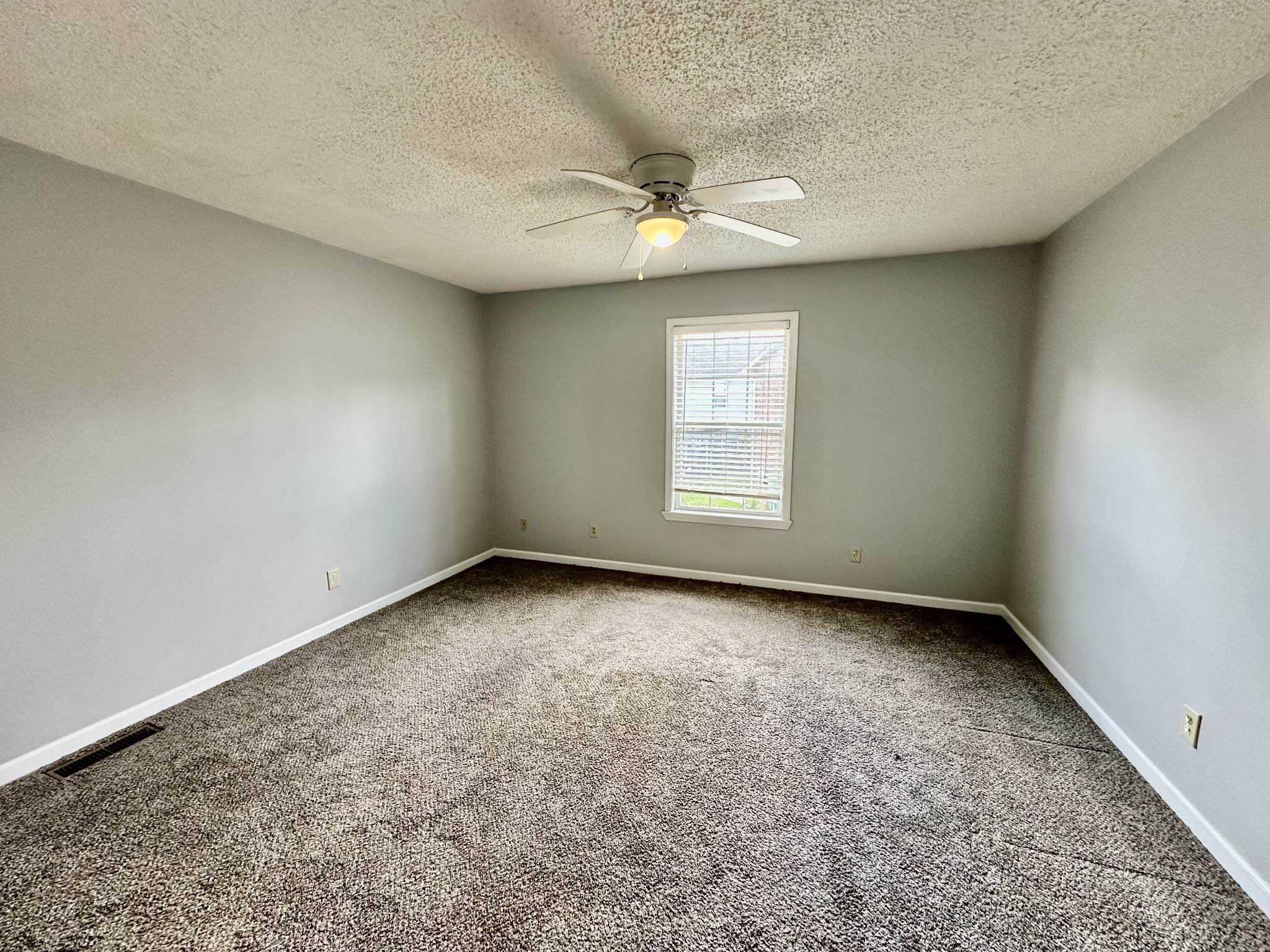 282 Raleigh Drive, Unit B Clarksville, TN 37043 - Photo 10 of 15 an empty room with a empty space and windows