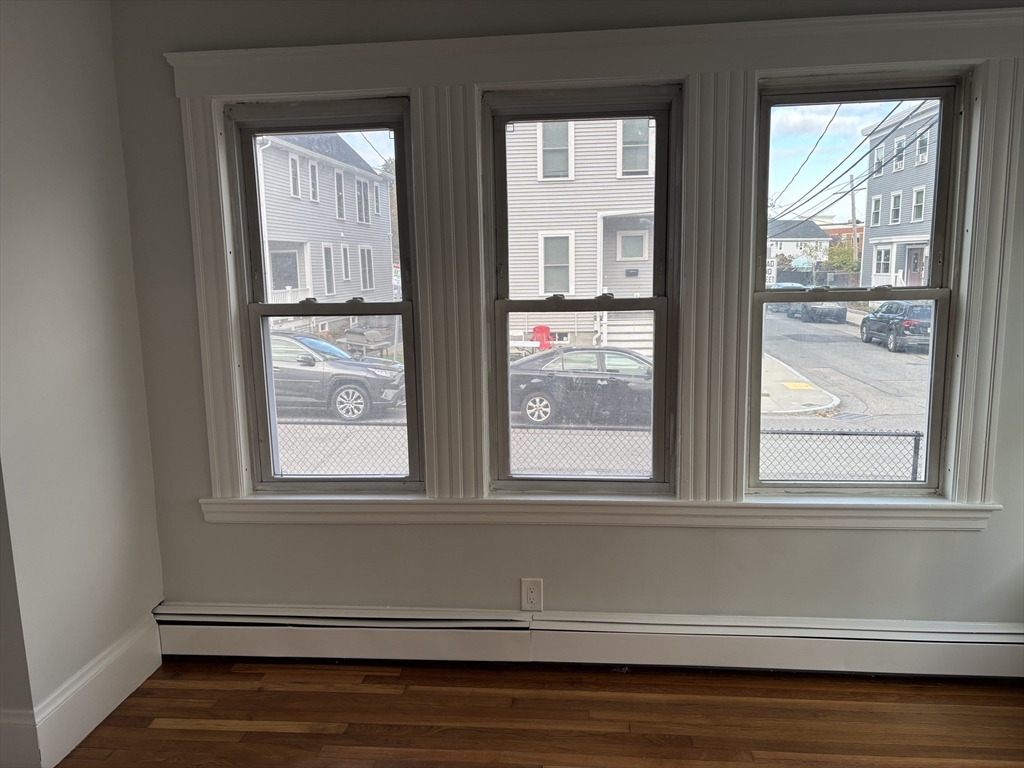 61 Waverly Street, Unit 2 Boston, MA 02135 - Photo 5 of 8 a view of a window in a house