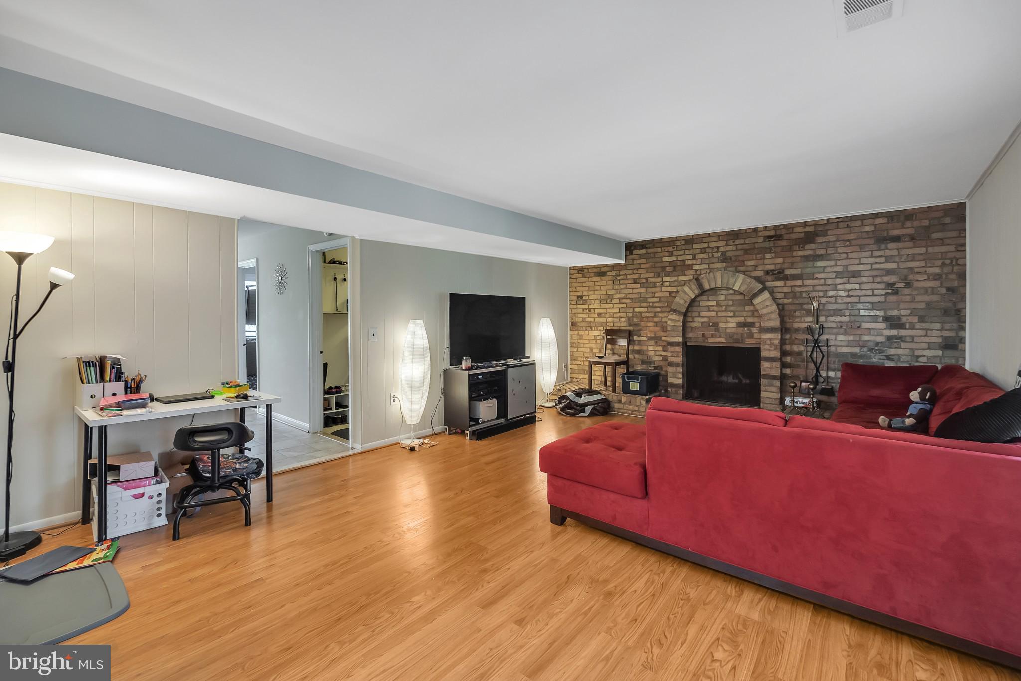 15136 Middlegate Road Silver Spring, MD 20905 - Photo 23 of 28 Fireplace in the family room
