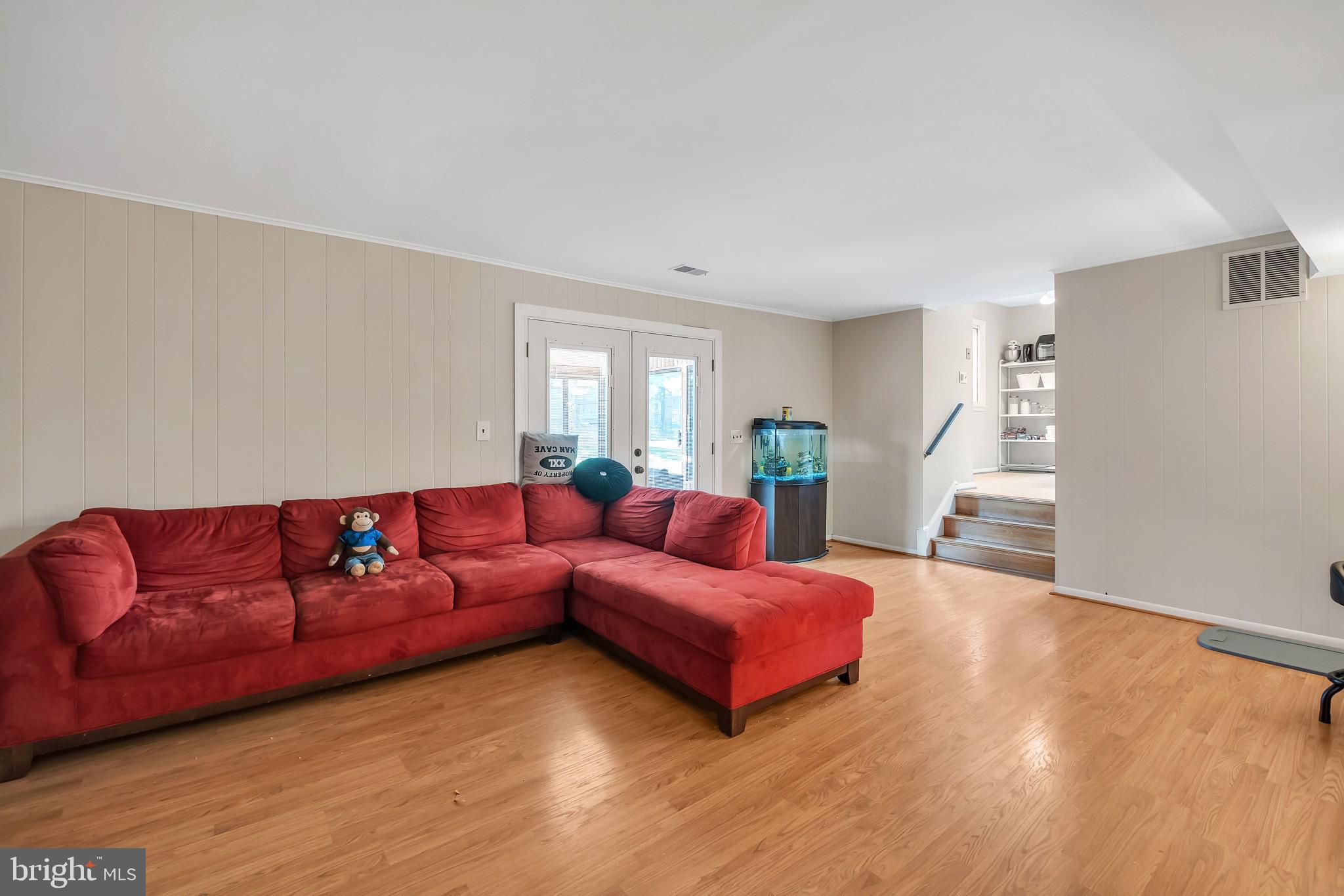 15136 Middlegate Road Silver Spring, MD 20905 - Photo 24 of 28 Spacious and well lit family room