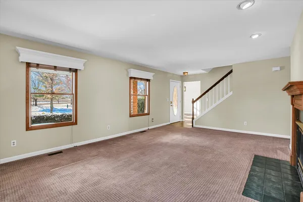 an empty room with windows