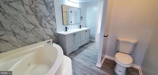 a bathroom with a sink and a toilet