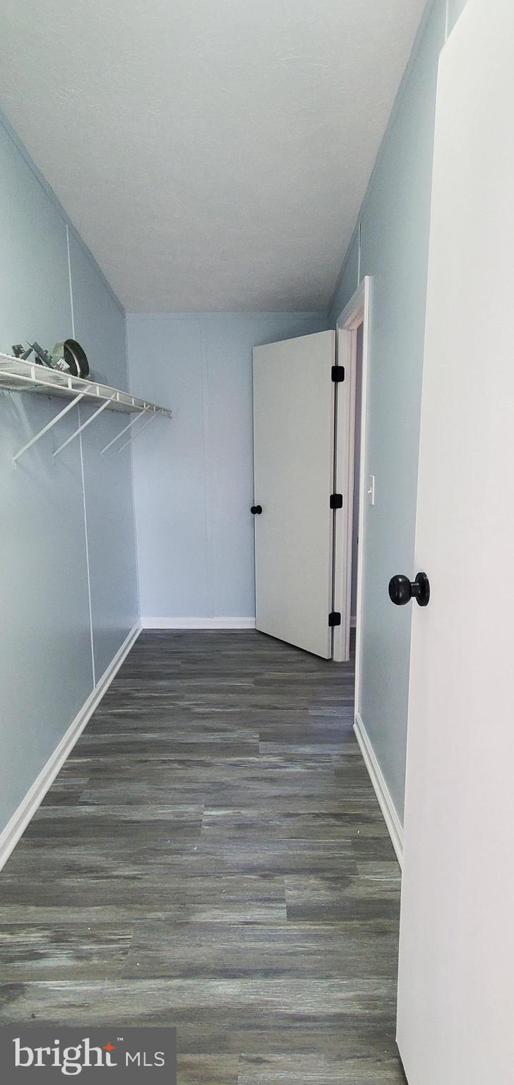 1903 Bennett Road Aberdeen, MD 21001 - Photo 8 of 8 a view of empty room with wooden floor