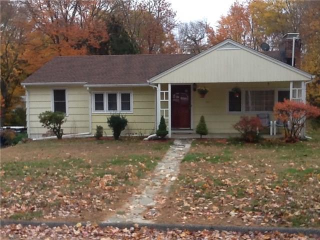 40 Craig Lane Trumbull, CT 06611 - Photo 1 of 1 a front view of a house with garden