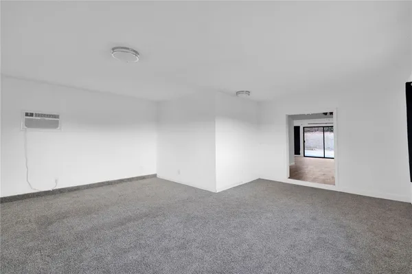 an empty room with a natural light